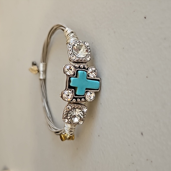 not sure Jewelry - Aqua cross and faux diamond bracelet with Guitar charm on the back. In EUC